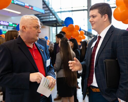 A male Soules College of Business student talks with a local business leader during a mock interview event at UT Tyker