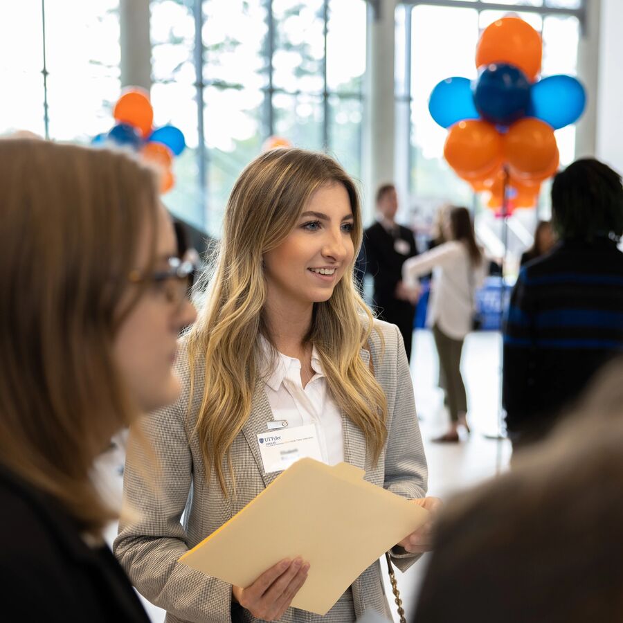 Female undergraduate students at a mock interview event held at UT Tyler's Soules College of Business