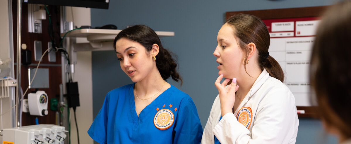 Two nursing students in a simulation hospital