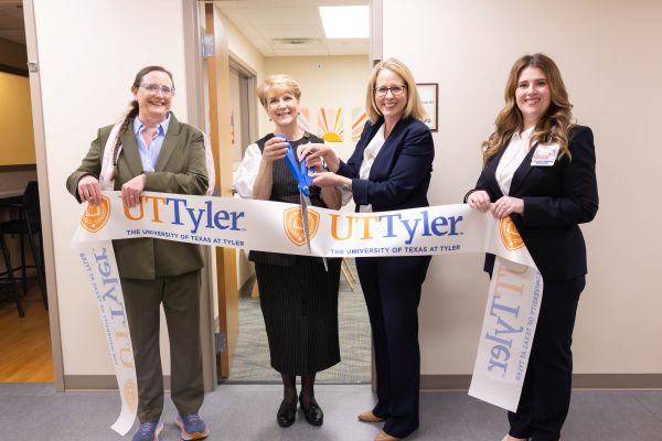 UT Tyler Speech, Language and Hearing Clinic Grand Opening: (L to R) Program Director Dr. Amy Louise Schwarz, Professor Dr. Andrea Gohmert, UT Tyler President Julie V. Philley, MD, and Clinic Manager Courtney Vinson gather for the ribbon cutting to the fully equipped Speech, Language and Hearing Clinic at the UT Tyler Health Science Center campus.