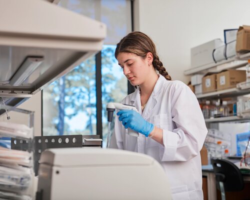 Pharmacy student preparing a sample