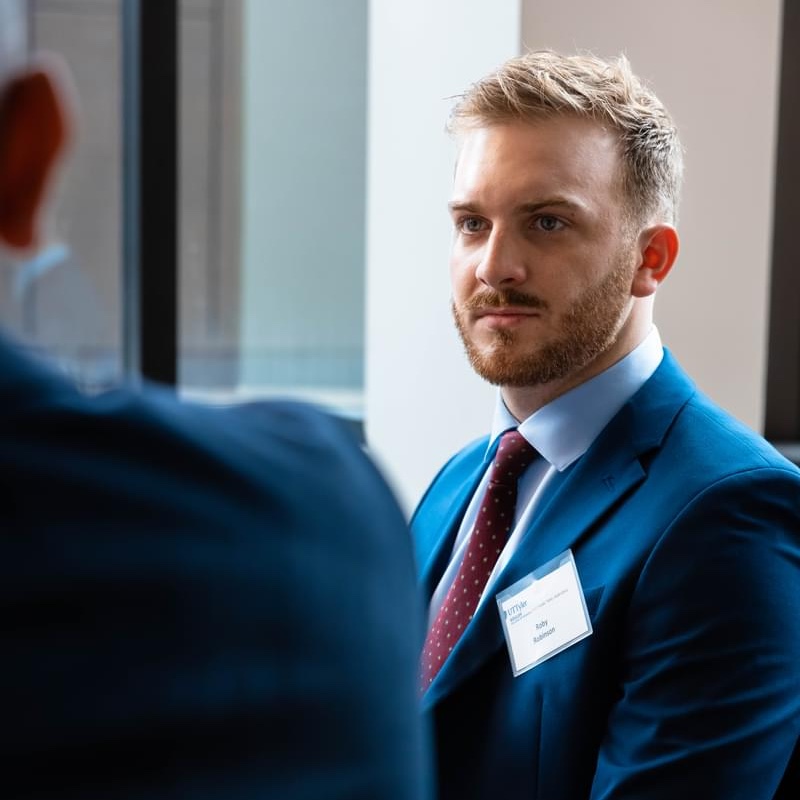 A male UT Tyler student participating in a mock interview