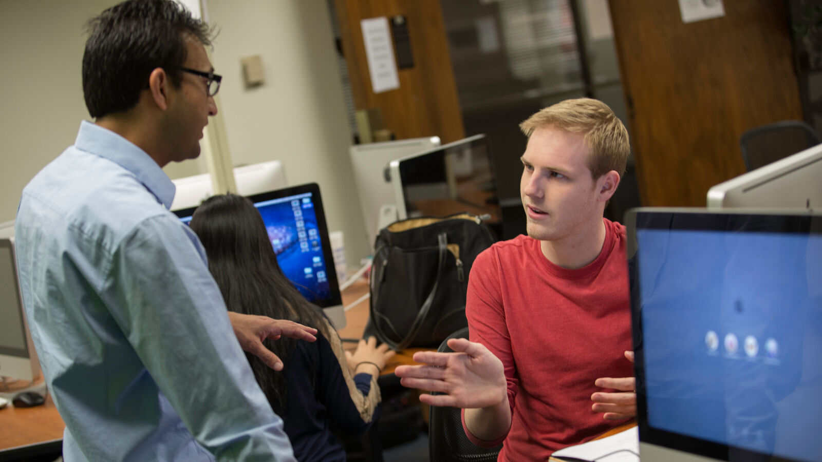 Two male students in the Mass Communication Lab at UT Tyler