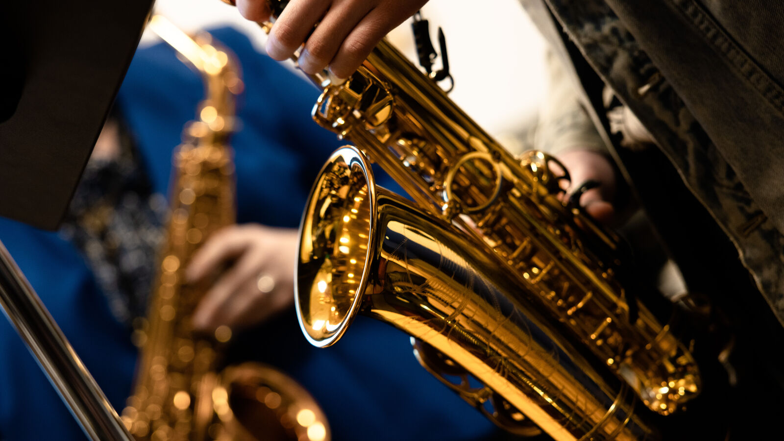 A BM in Music student playing the saxophone in UT Tyler's Music Department