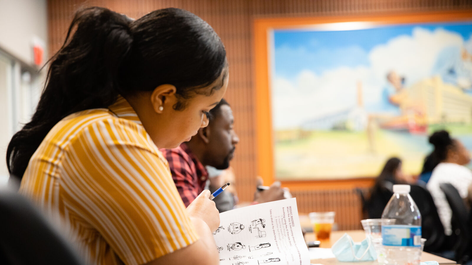 Clinical Mental Health Counseling students in the audience during a presentation at UT Tyler's Public Health Week