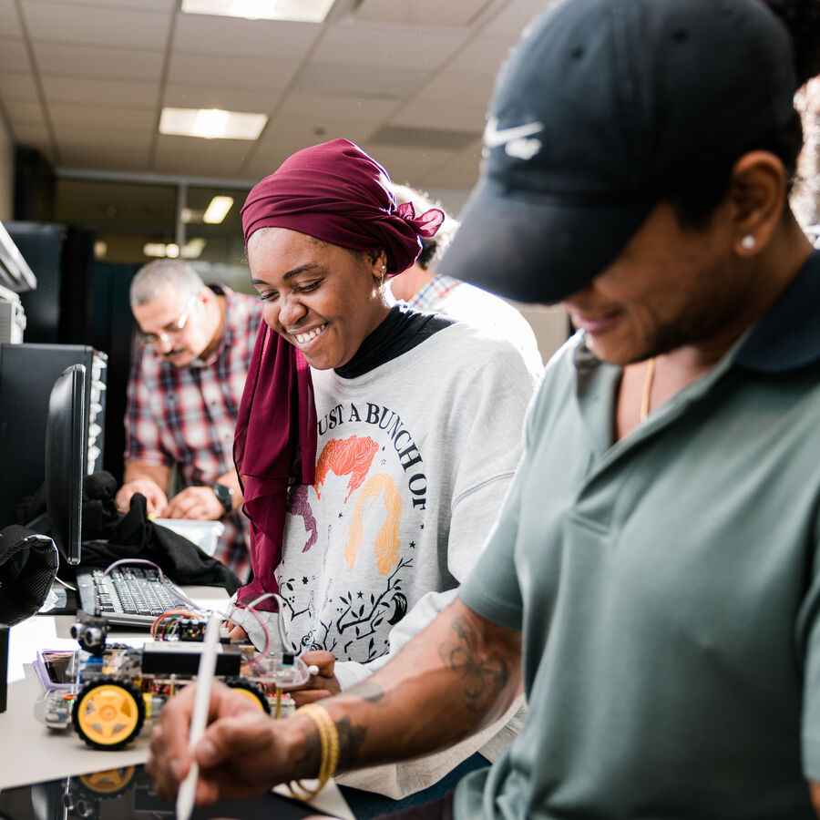 UT Tyler students working on an engineering project.