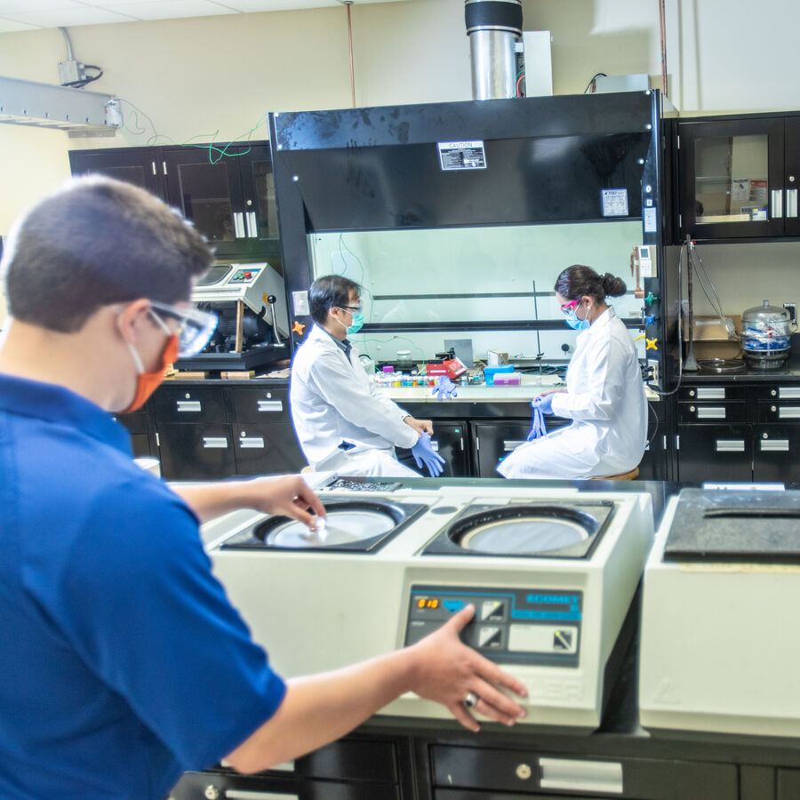 A group of College of Engineering students in a lab environment at The University of Texas at Tyler