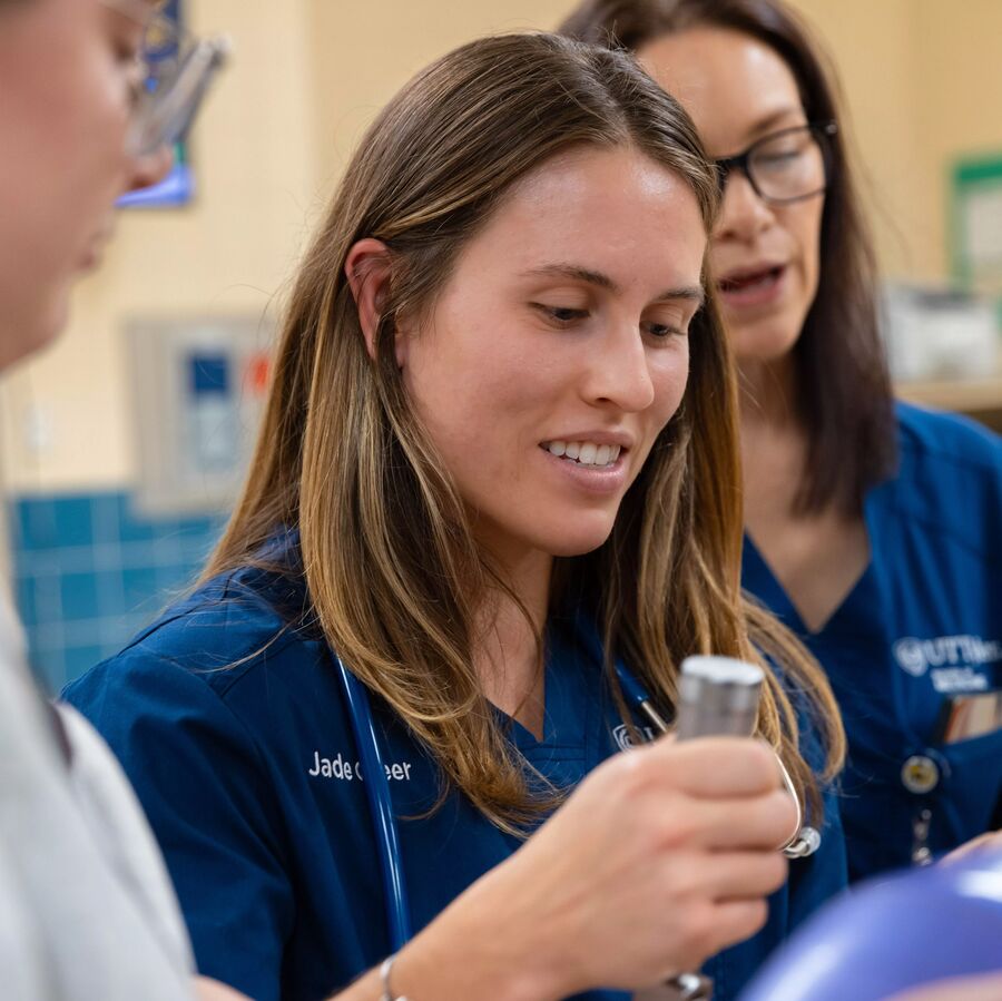 Two UT Tyler School of Health Professions graduate students at the SMILE collaborative lab