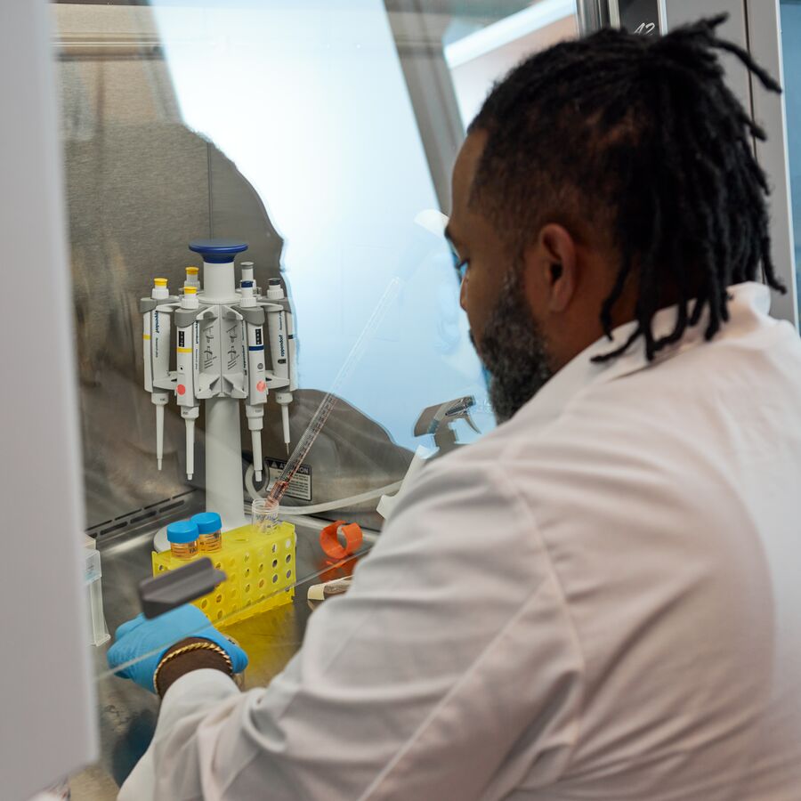 A student from The University of Texas at Tyler's MS in Biotechnology program conducts research in a laboratory