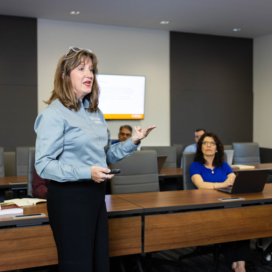 A lecture during an evening class for the Executive MBA program at 's Soules College of Business