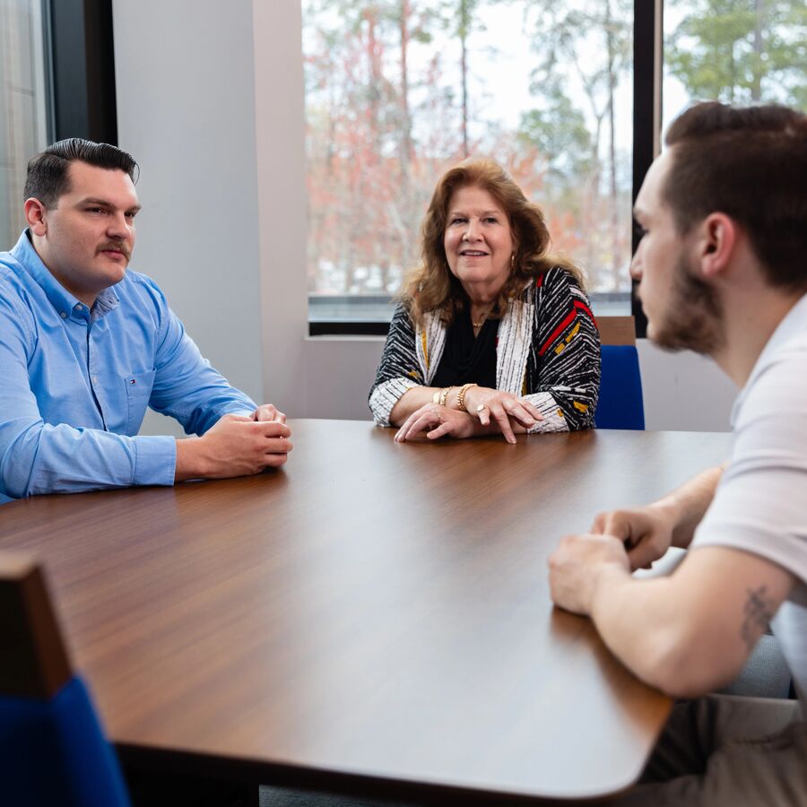 A transfer student meets with academic advisers at UT Tyler