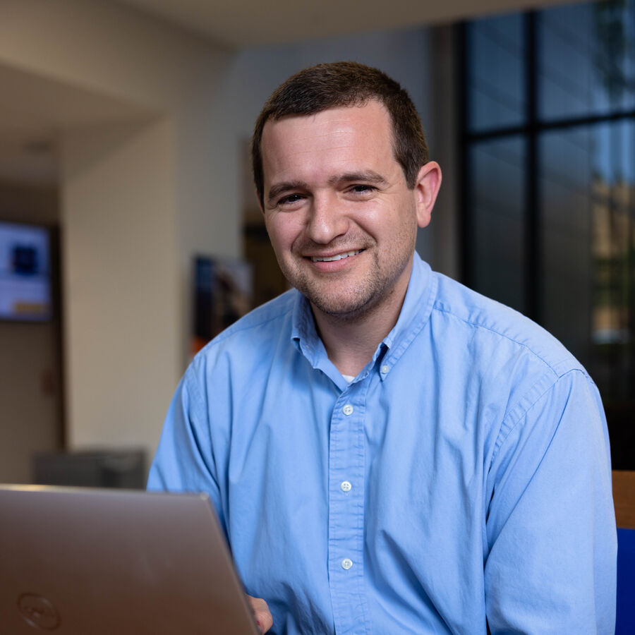student with computer