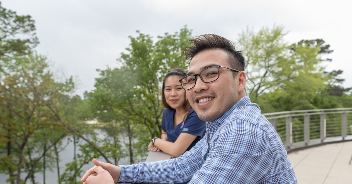 Two students on a balcony