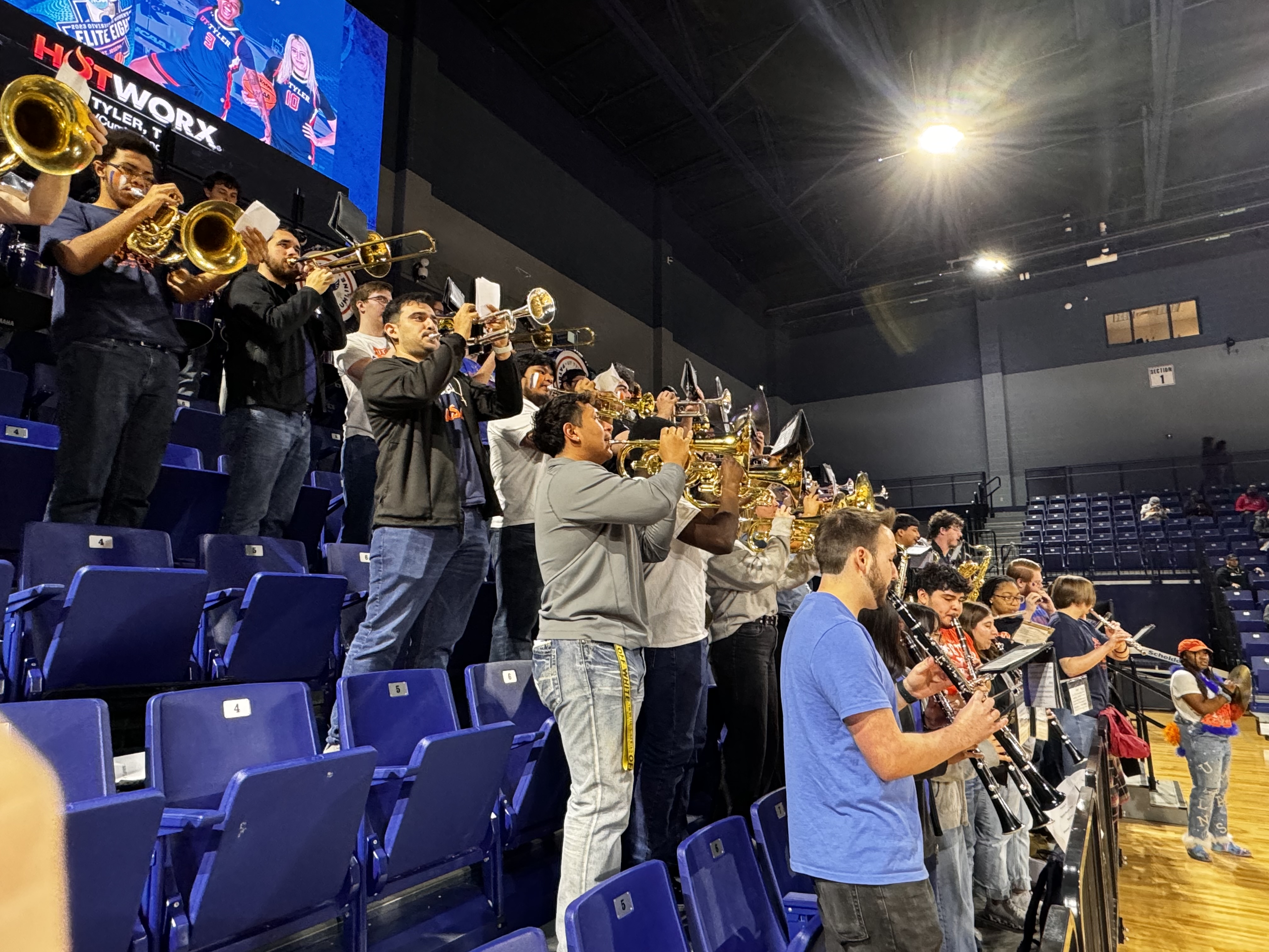 Students all playing musical instruments