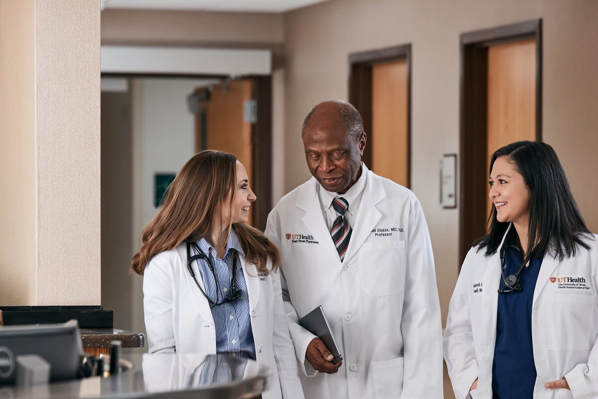 Two medicine students and a professor