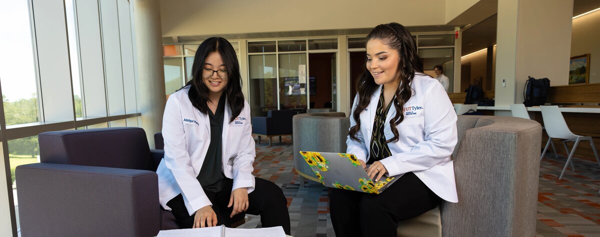 Two medicine students studying