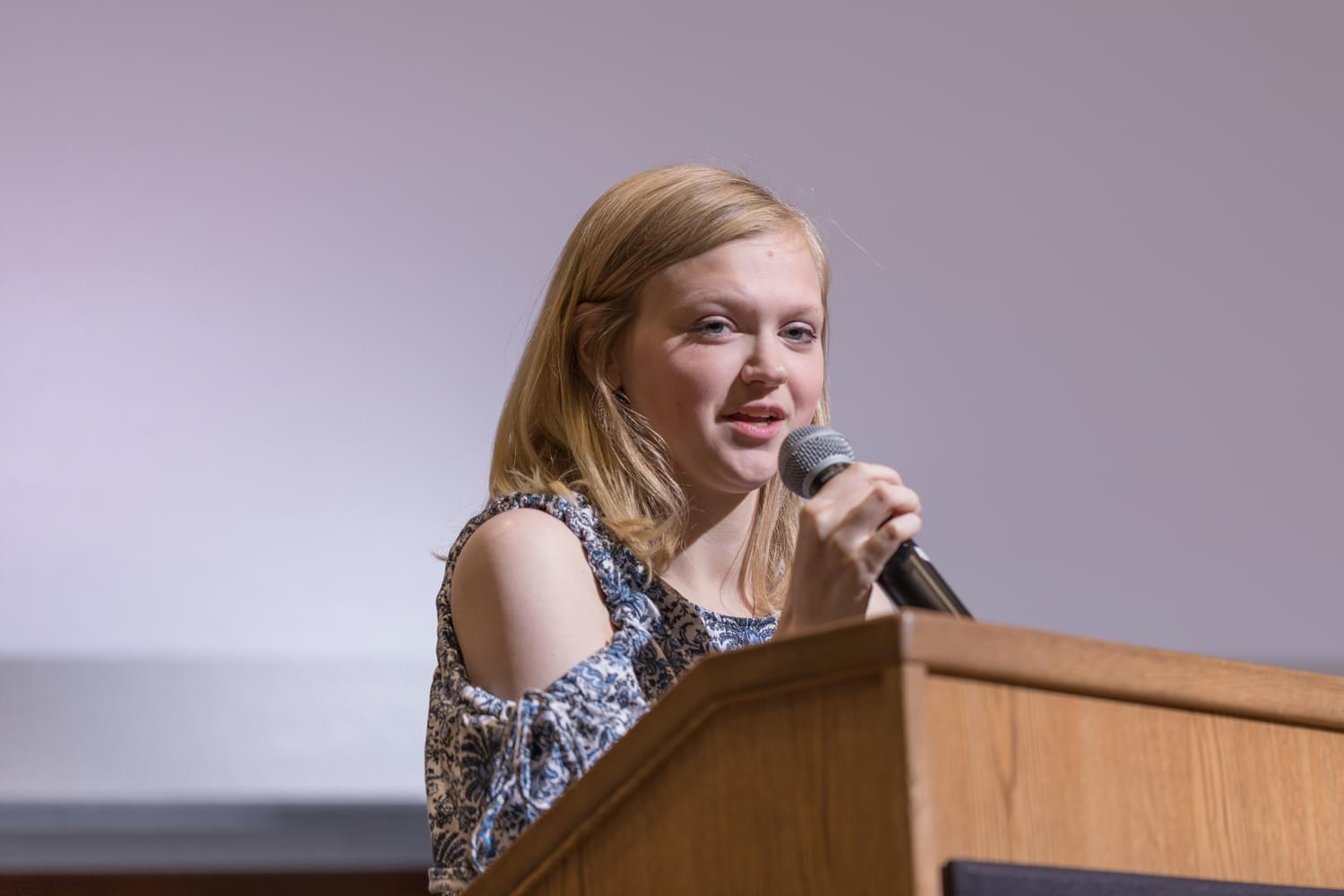 Female speaking to an audience