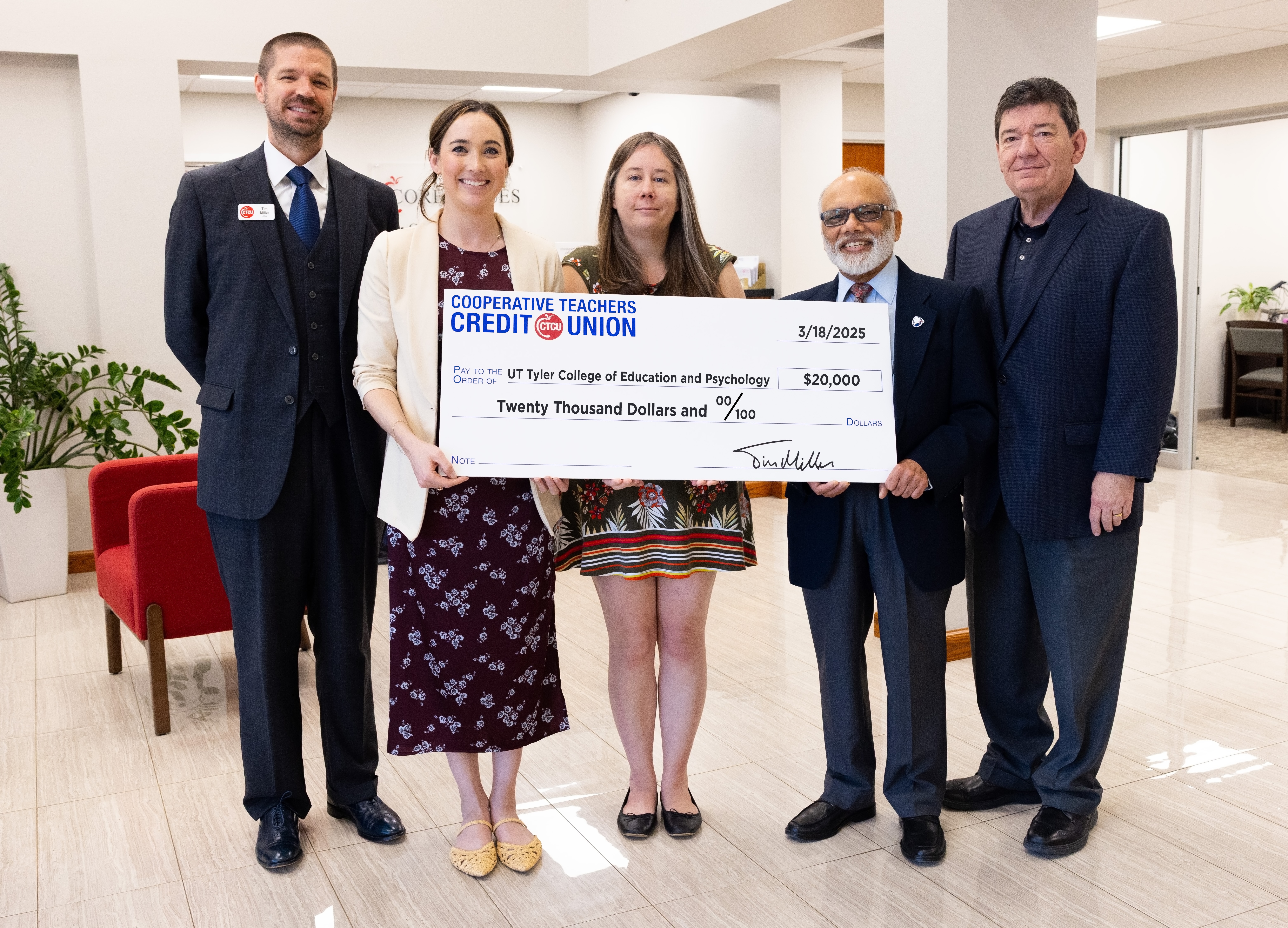 CTCU and UT Tyler officials with check