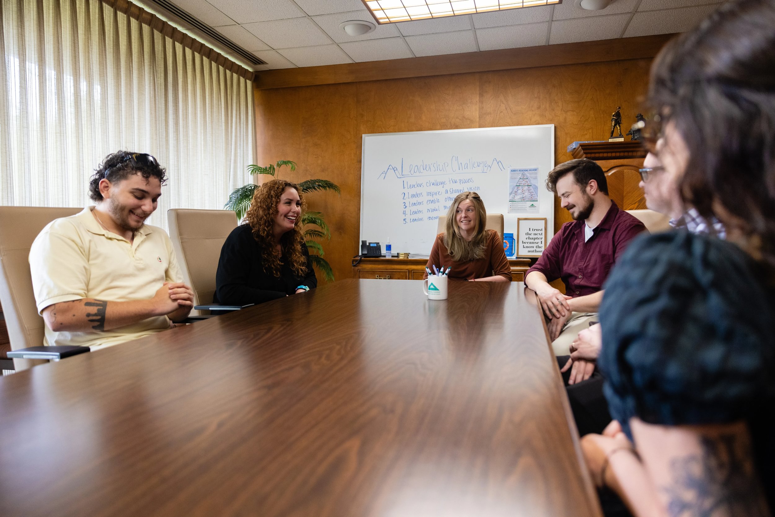 Deaton with student mentors at the Andrews Center