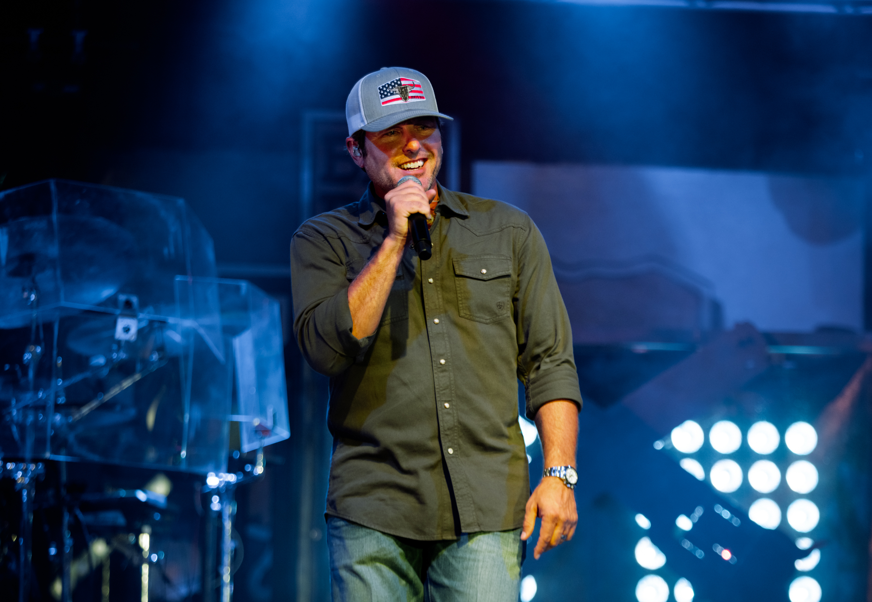 Publicity photo of Casey Donahew on stage singing