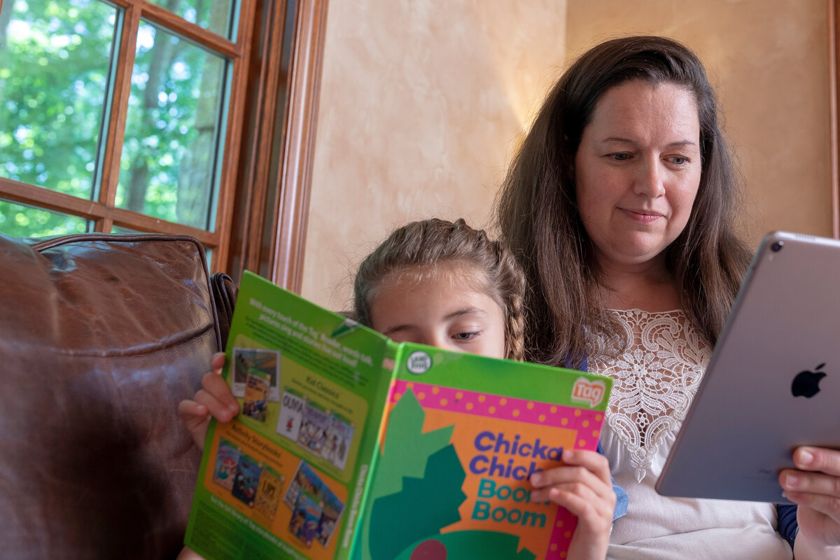 Adult Student and Child Reading