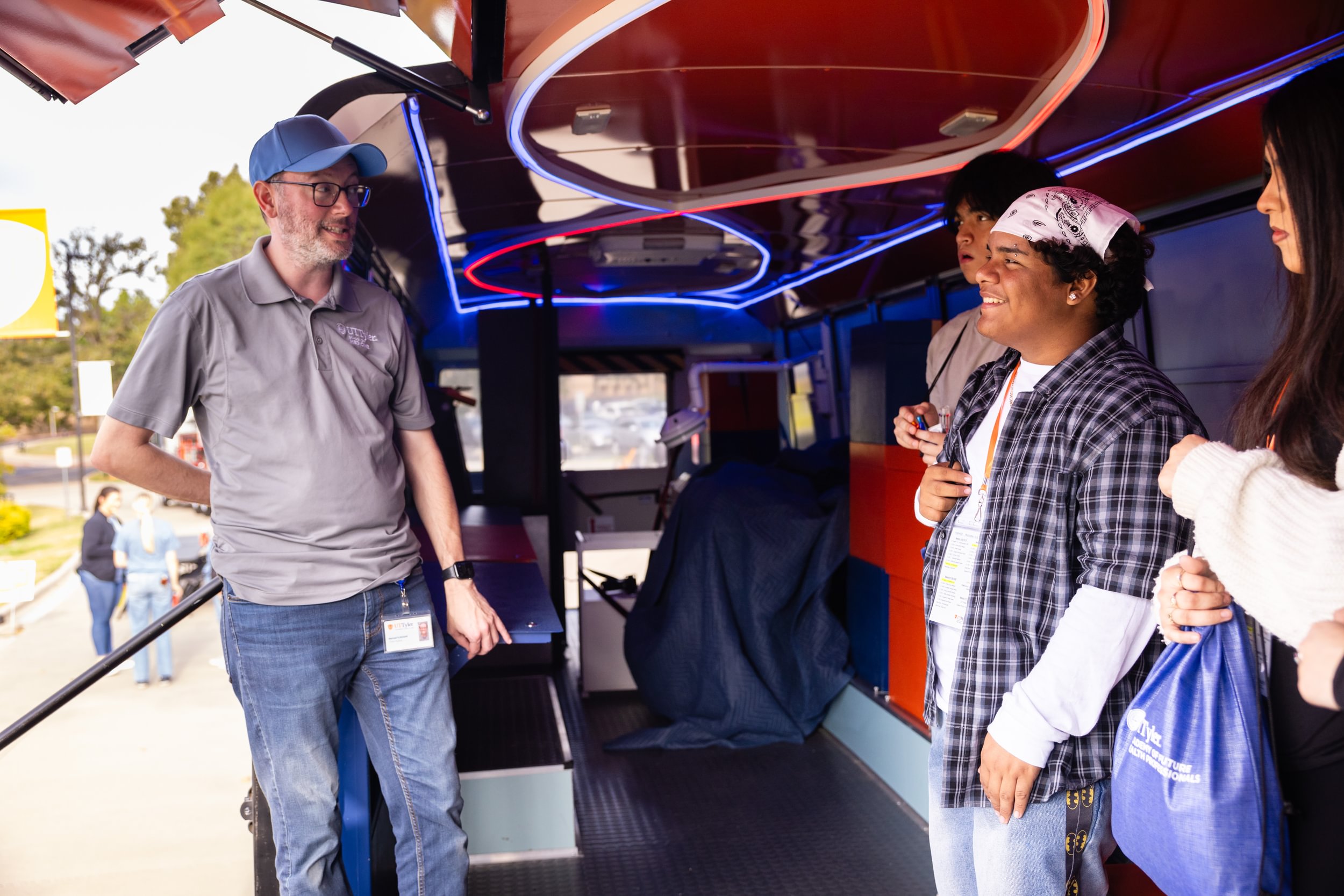 Students inside the SOM Mobile Unit on campus during the 2024 Pre-Health Conference