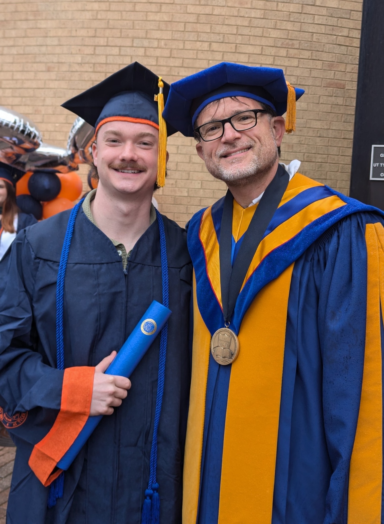 Conneen and Banta after the spring 2025 commencement ceremony May 3 at the UT Tyler Cowan Center