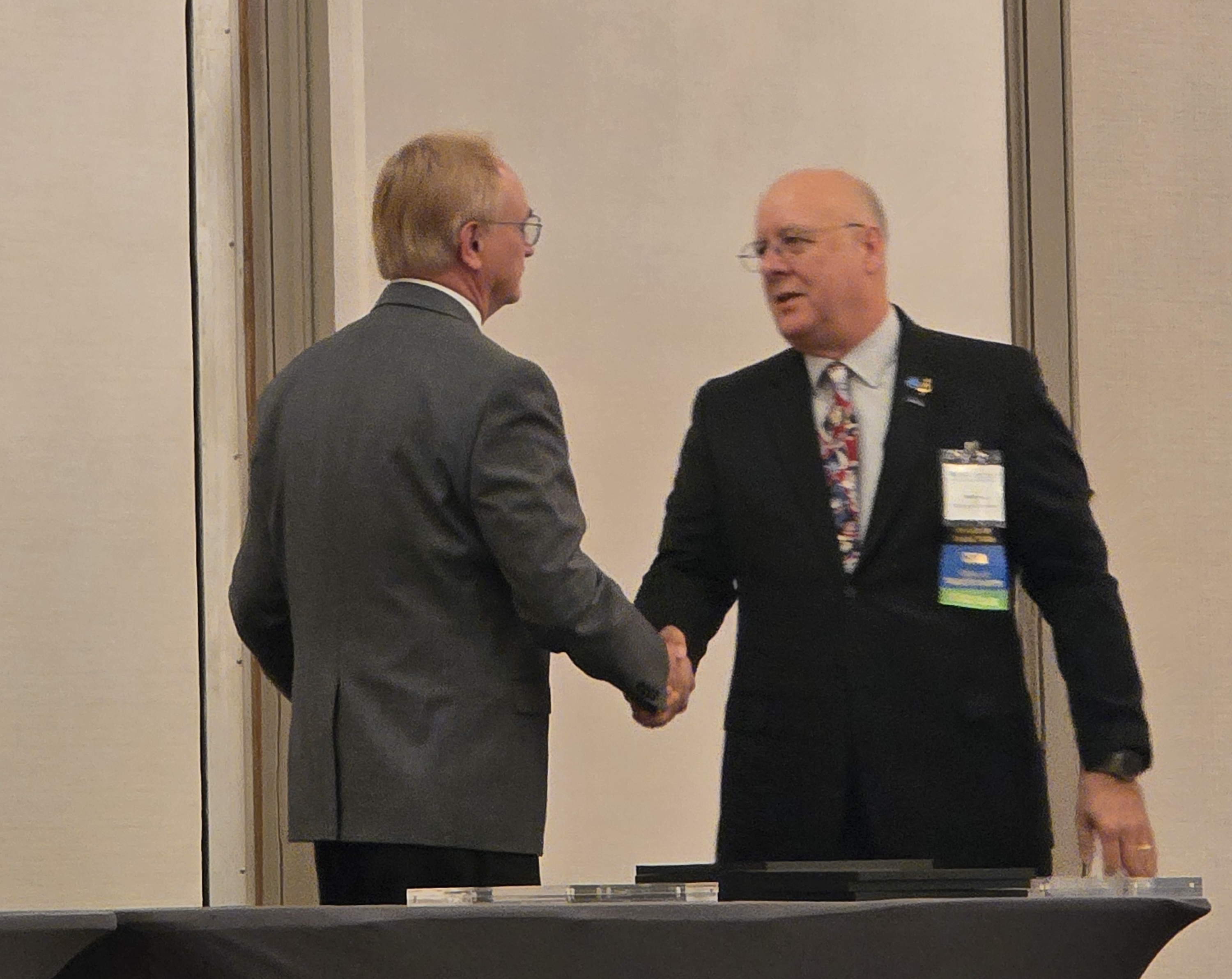 Miller accepting Senior Fellow Award during the 2025 ATMAE national conference