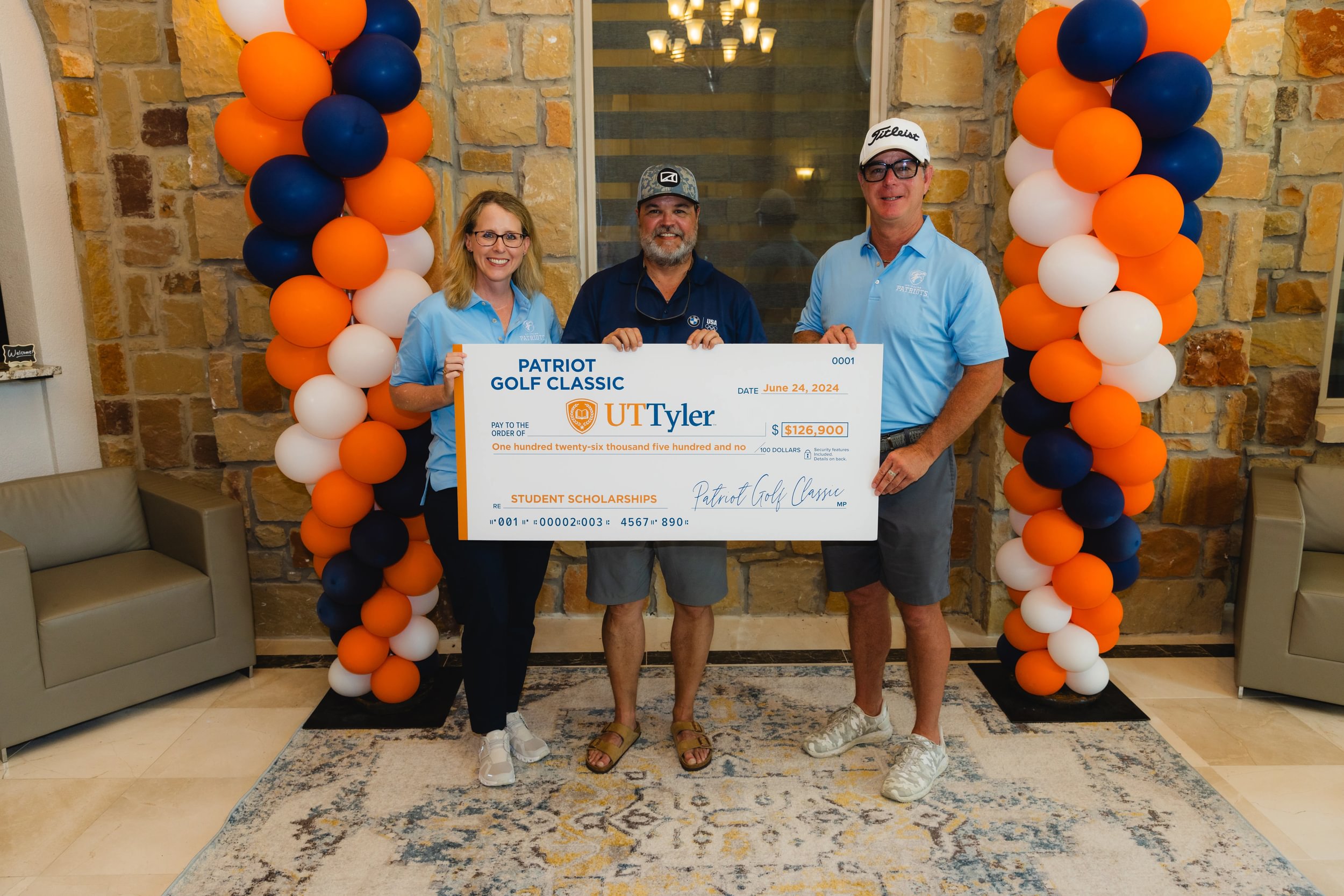 UT Tyler President Philley, Jim Teeter and Jay Ward presenting check