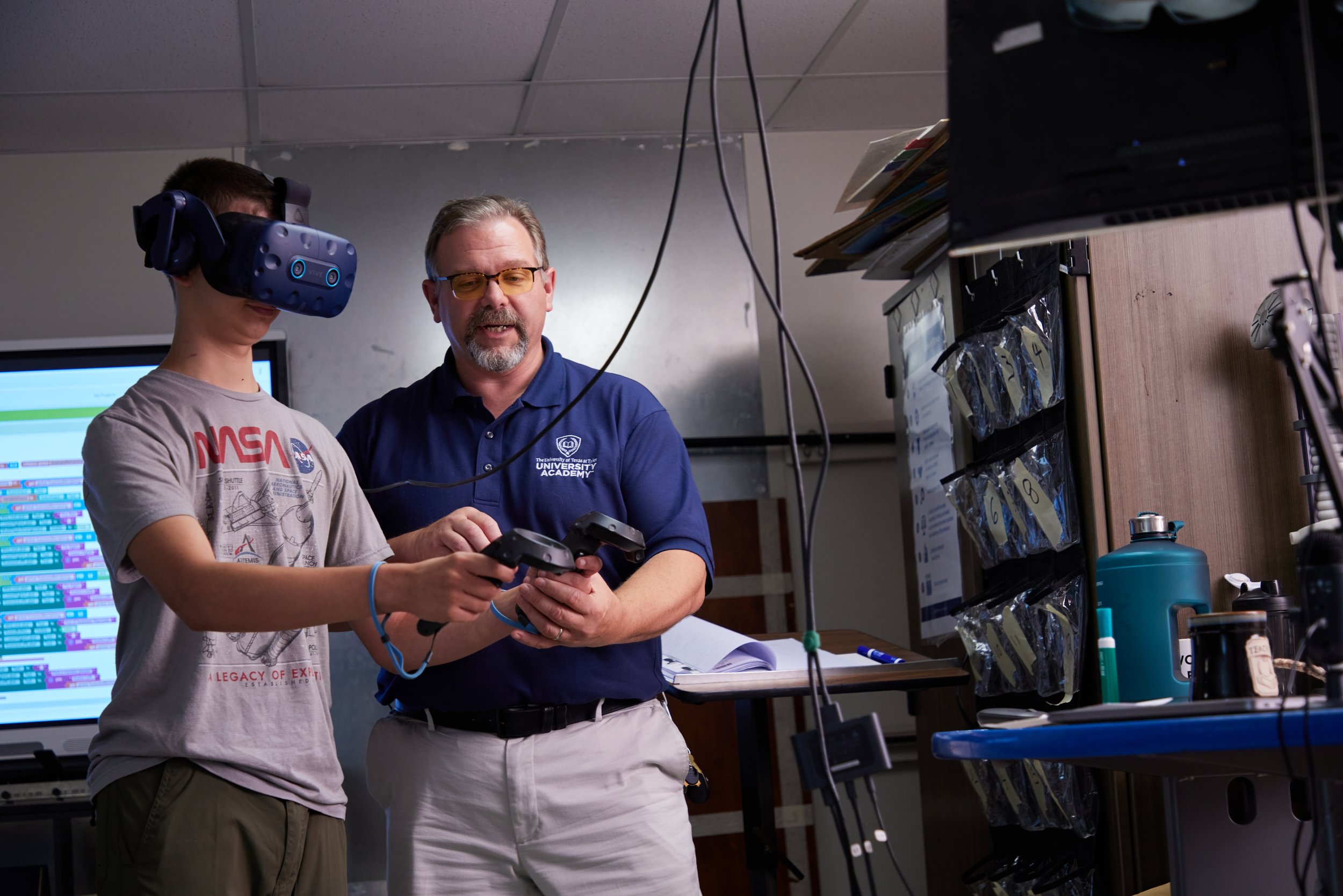 UA–Tyler teacher with student using VR