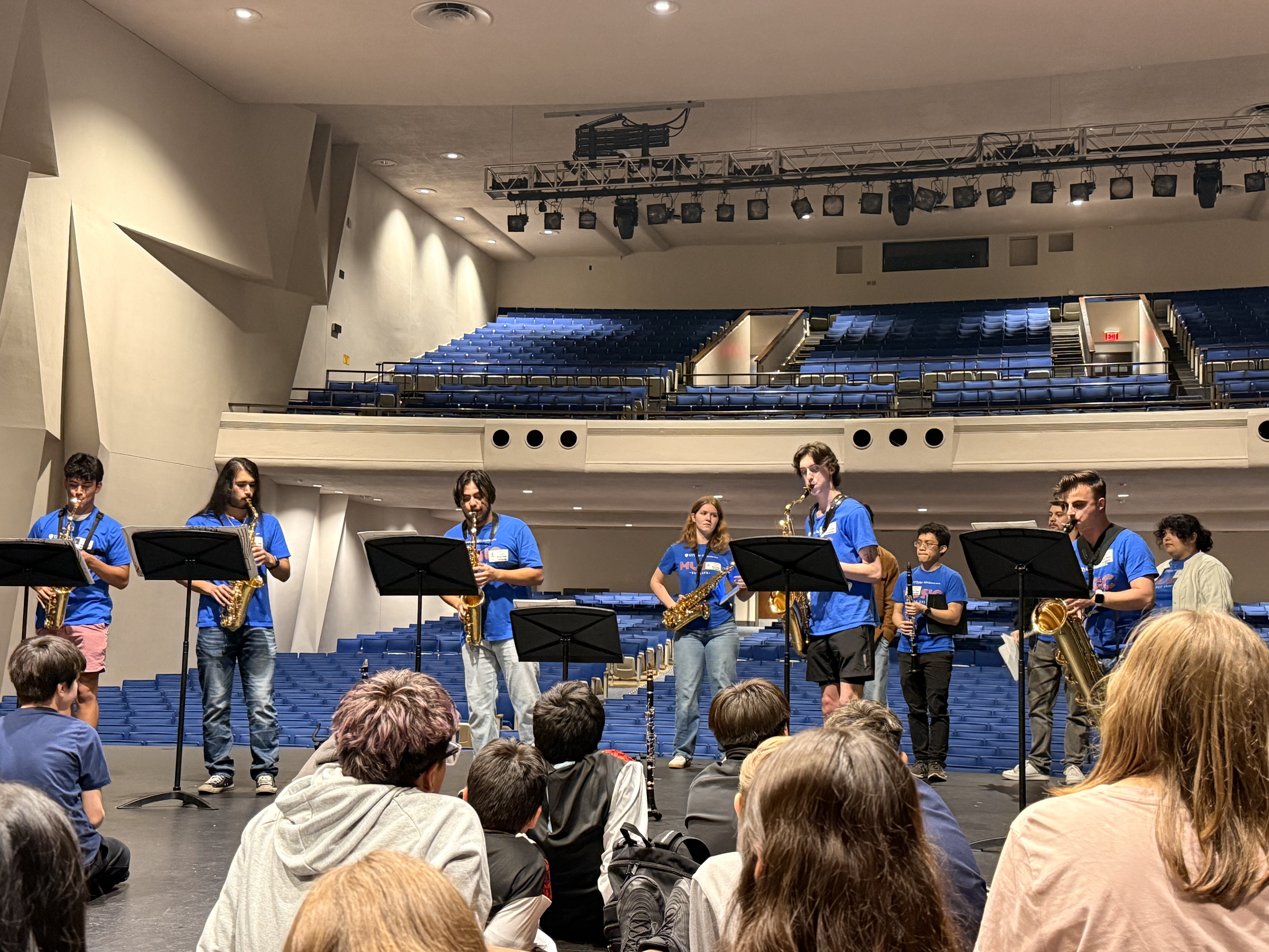 Group of UT Tyler student musicians playing selections of upcoming concert to Caldwell student artists on Oct. 23 at Caldwell Arts Academy.