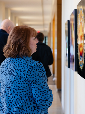 Fisch College of Pharmacy pARTnership: Visitors view the 36 original pieces added to W.T. Brookeshire Hall, home of the Ben and Maytee Fisch College of Pharmacy. The pARTnership began eight years ago as a means to inspire pharmacy students and faculty through art.