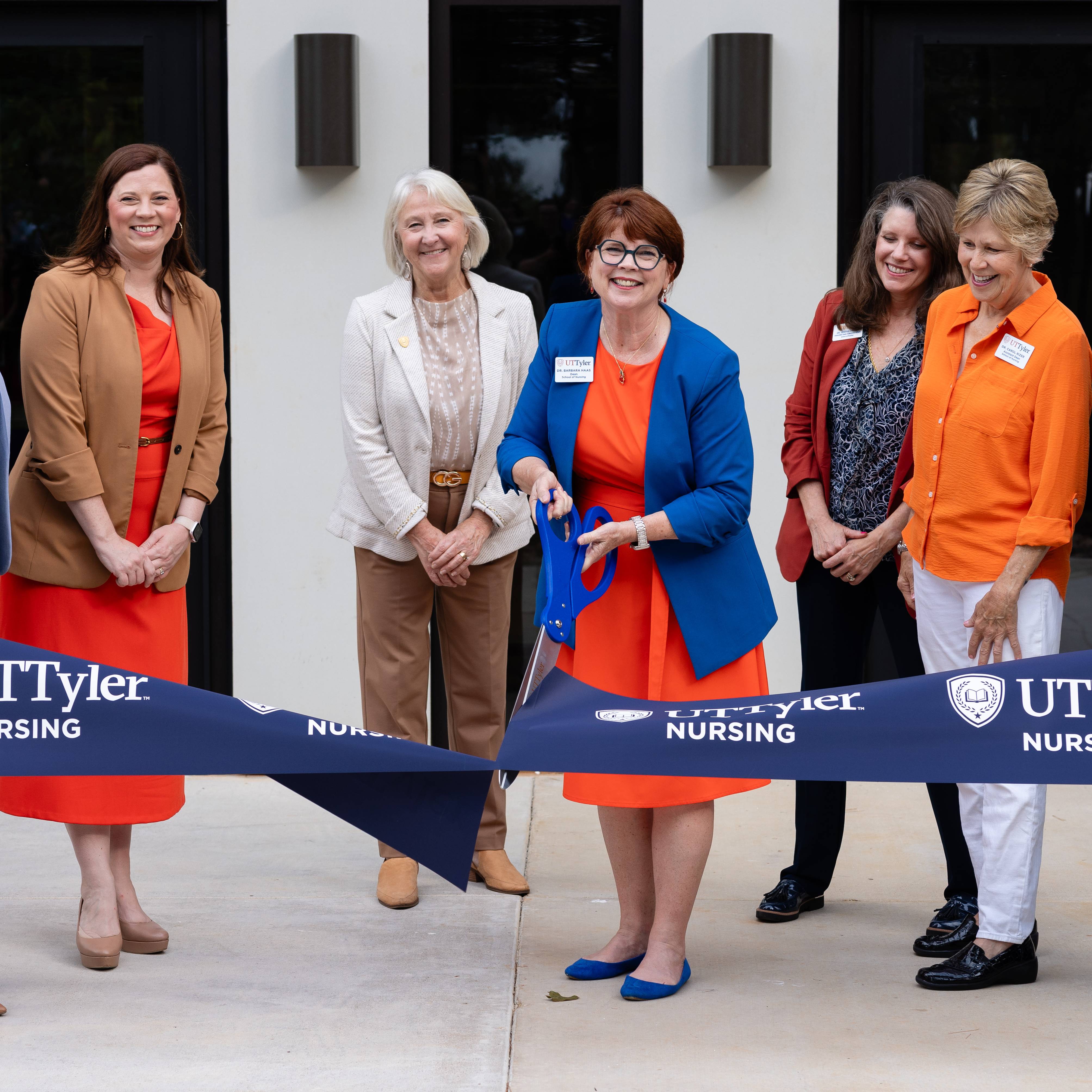 (L to R) President Julie V. Philley, Dr. Maggie Ruelle, Dr. Susan McBride, Dean Barbara K. Haas, Dr. Jenifer Chilton, Dr. Carol Rizer and Dr. Amir Mirmiran gather for the ribbon cutting to the expansion of the Braithwaite Building.