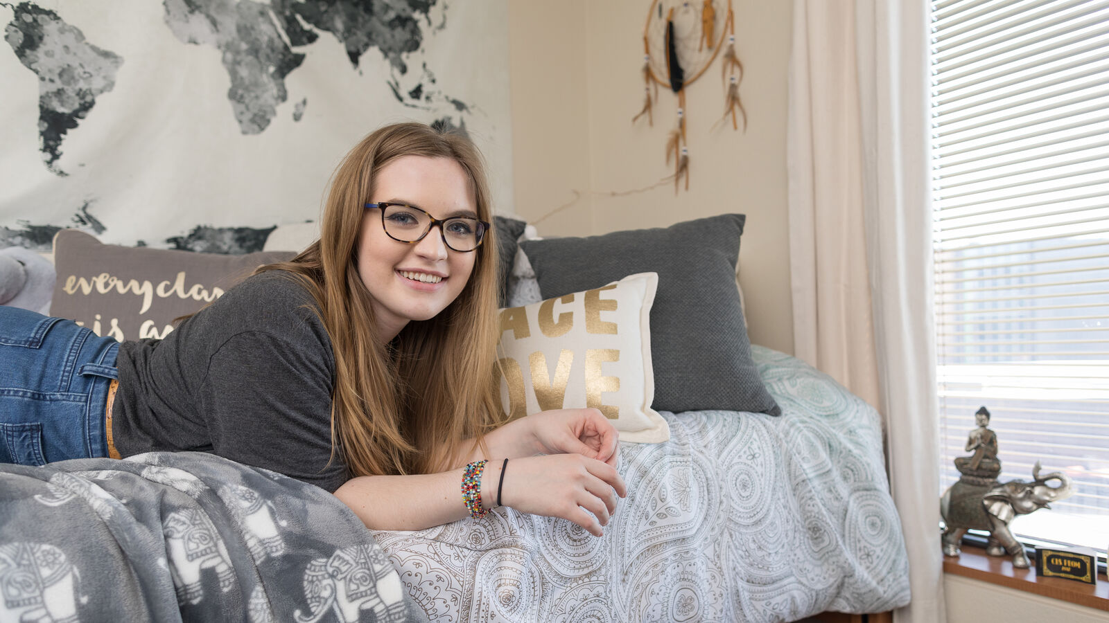 A female student in a room in UT Tyler's Ornelas Residence Hall