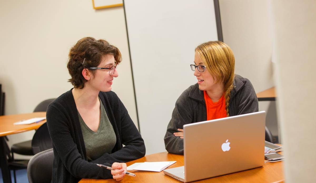 Students Studying at a round table