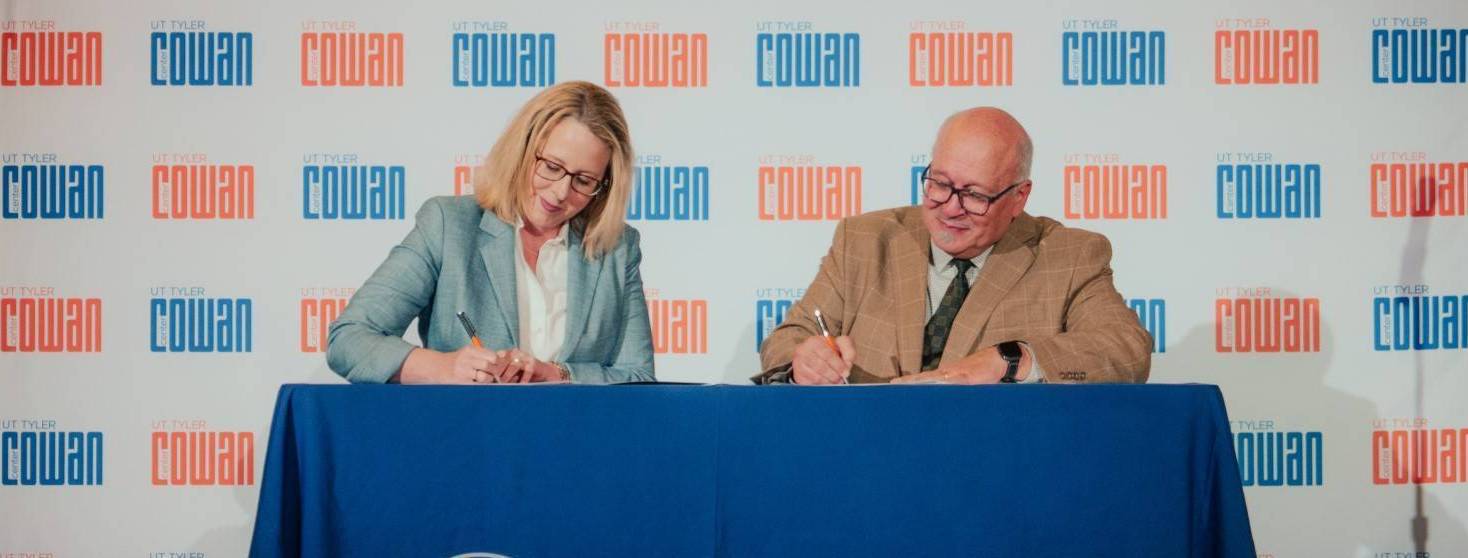 Dr. Philley signing the ETYO MOU 