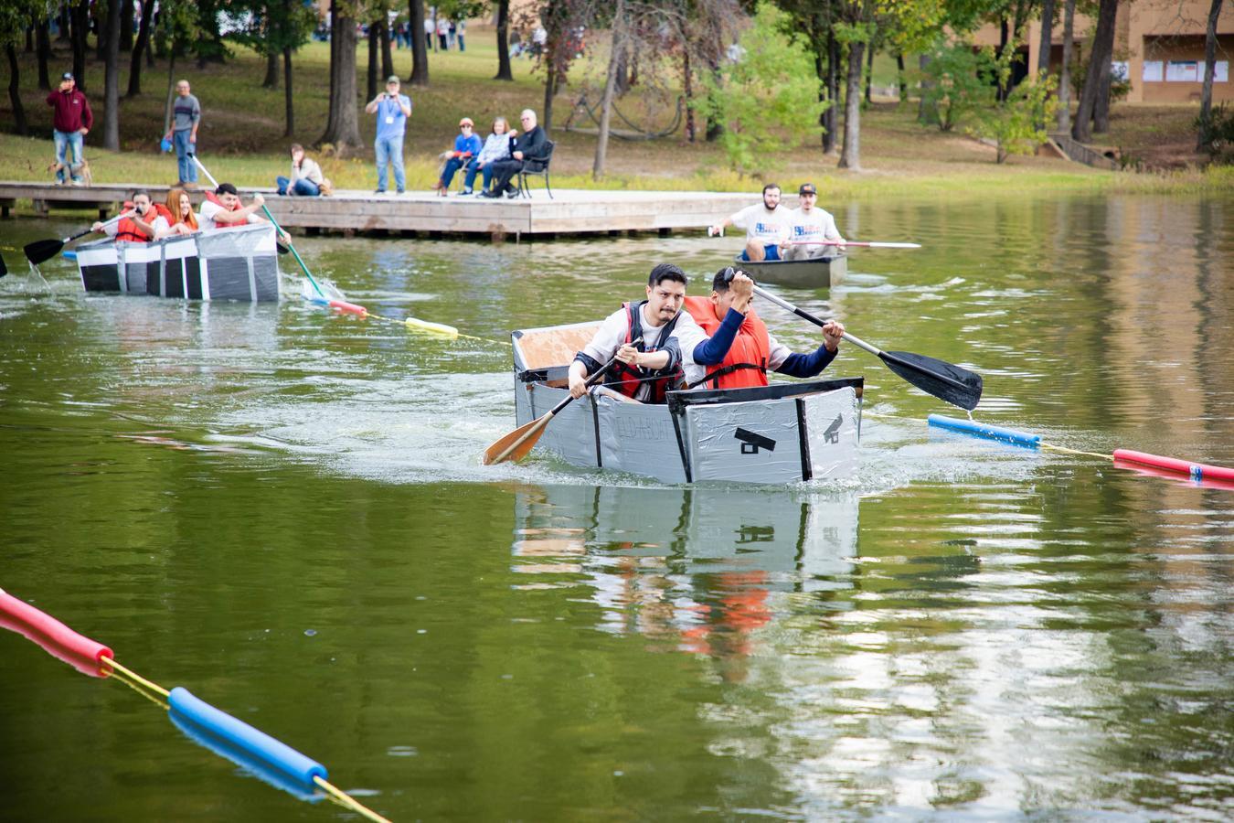 engineering student rowing across Harvey Lake