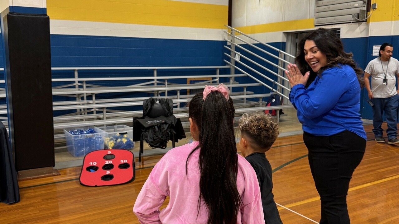 Staff doing table game at Harts Bluff Health Fair
