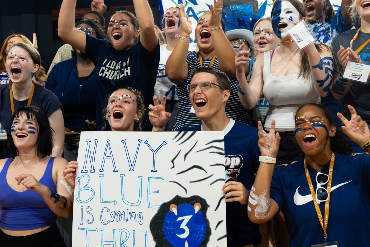 Students in Navy Blue Cheering