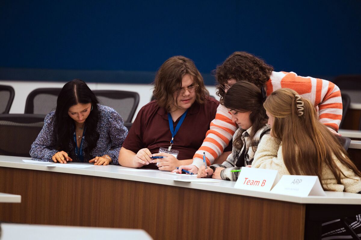 Ethics Bowl team conferring