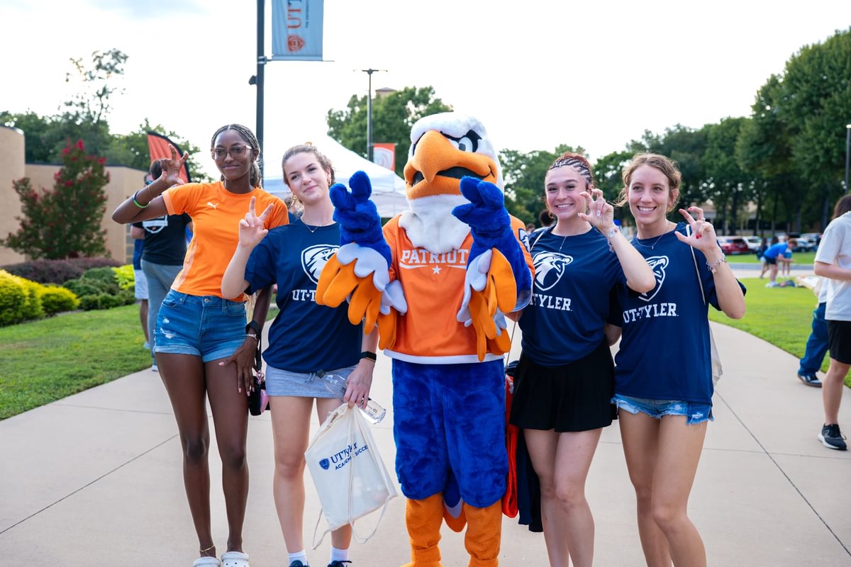 Group of students posing with Swoop