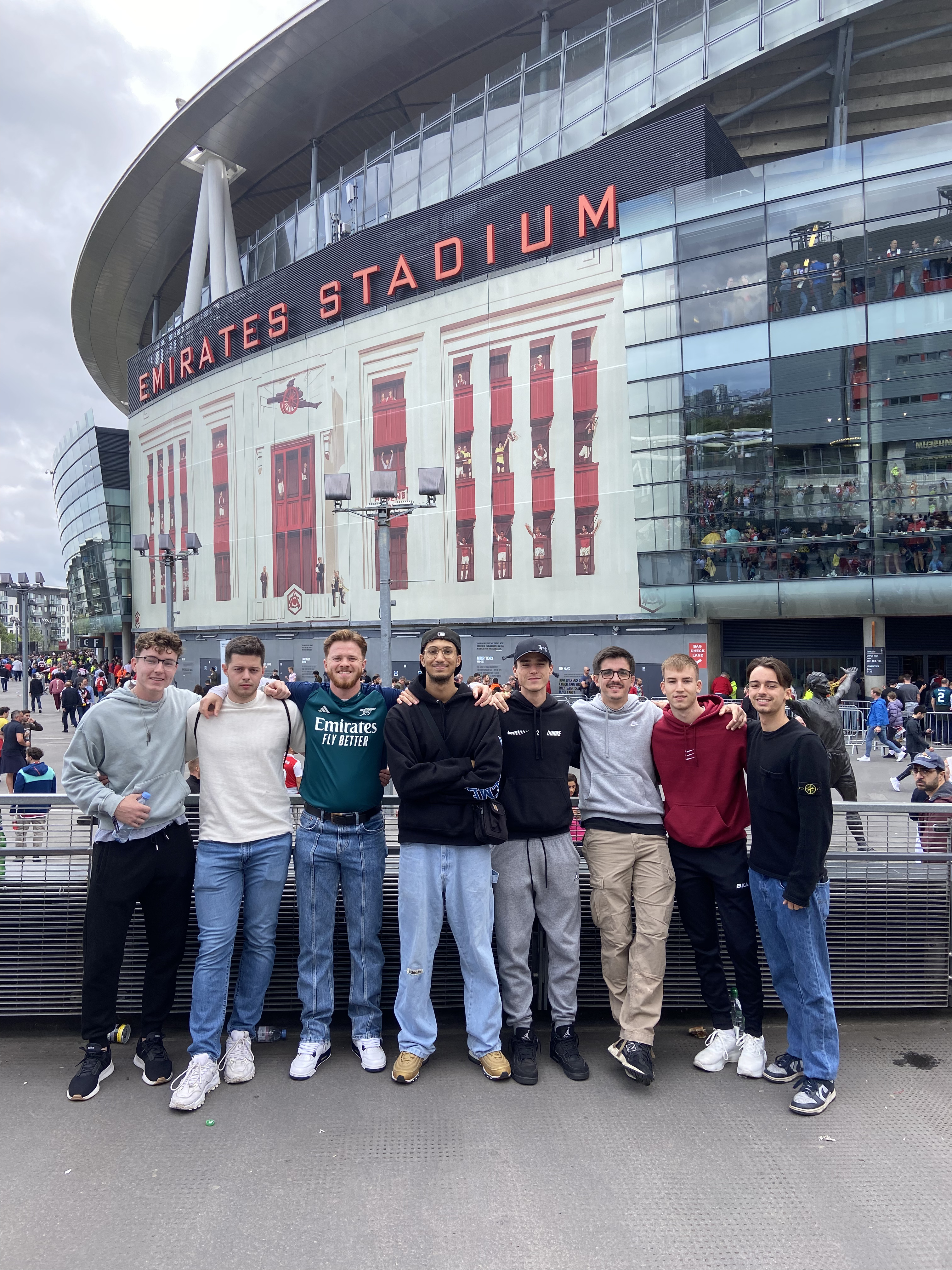 Cade attending a soccer match with his roommates.
